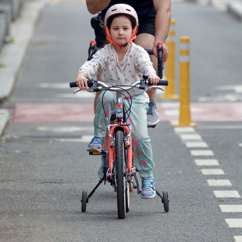 Child on tricycle